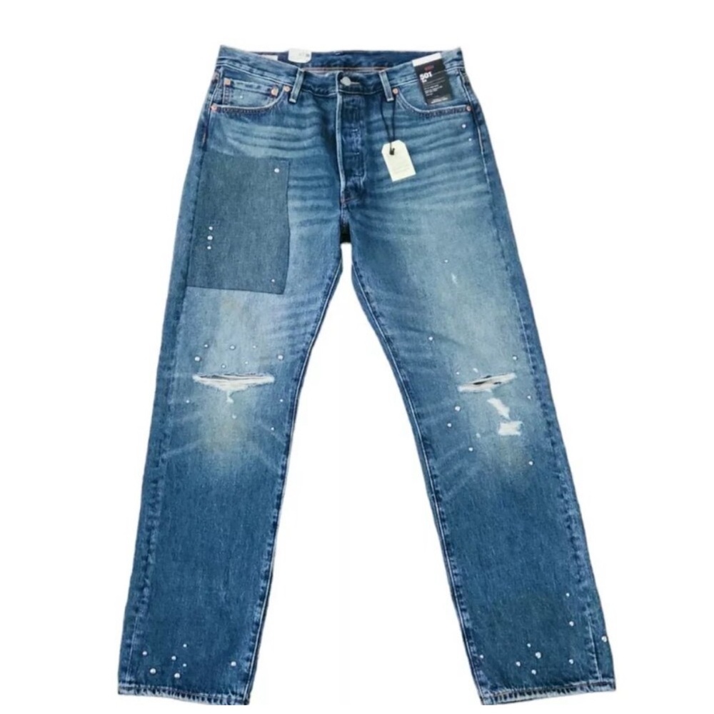 Levi Blue 501’54 Distressed  with rips patch, studs back and front of jeans